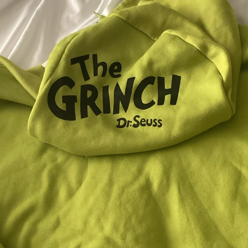 Dr. Seuss Lime Green Grinch Face Hoodie with Yellow Eyes